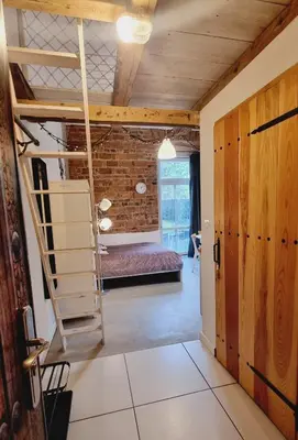 Łóżko lub łóżka w pokoju w obiekcie Stara Poczta Apartament