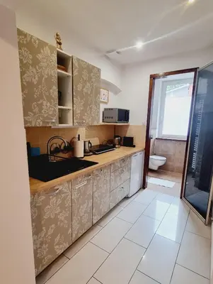 Kuchnia lub aneks kuchenny w obiekcie Stara Poczta Apartament