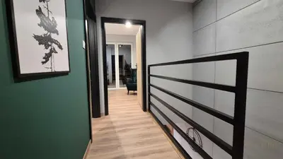 Łóżko lub łóżka w pokoju w obiekcie Black Hill Pod Zieleńcem Apartament AURORA GOLD Nr3 z Sauną