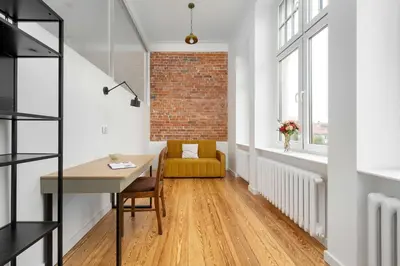 Część wypoczynkowa w obiekcie Elegant and Bright Apartment Plac Staszica Perfect for Remote Work by Renters Prestige