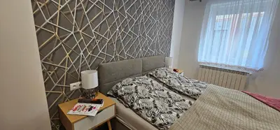 Łóżko lub łóżka w pokoju w obiekcie Apartament 9 Delux - Bliżej Zdroju