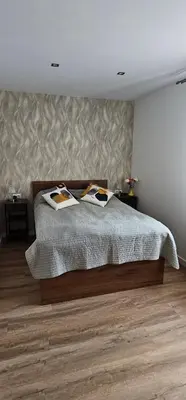 Łóżko lub łóżka w pokoju w obiekcie Apartament 9 Delux - Bliżej Zdroju
