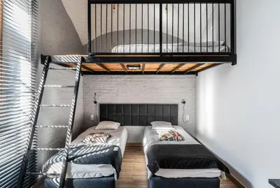Łóżko lub łóżka w pokoju w obiekcie Apartament Paryski 1- loftowe studio blisko Rynku