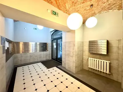 Łóżko lub łóżka w pokoju w obiekcie Apartament Paryski 1- loftowe studio blisko Rynku