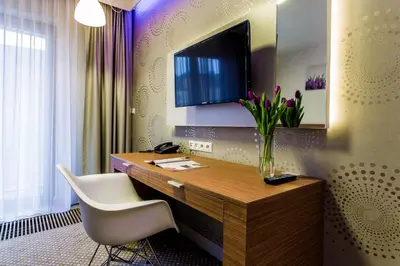 Telewizja i/lub zestaw kina domowego w obiekcie Hubska Apartments