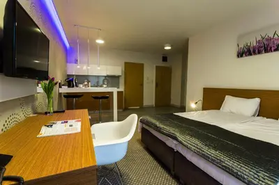 Telewizja i/lub zestaw kina domowego w obiekcie Hubska Apartments