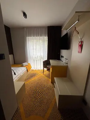 Łóżko lub łóżka w pokoju w obiekcie Eclipse Budget Rooms