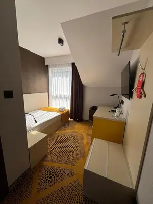 Łóżko lub łóżka w pokoju w obiekcie Eclipse Budget Rooms