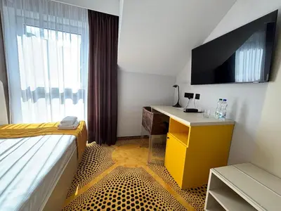 Telewizja i/lub zestaw kina domowego w obiekcie Eclipse Budget Rooms