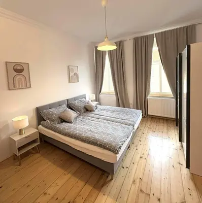 Łóżko lub łóżka w pokoju w obiekcie Parkview Premium Apartment