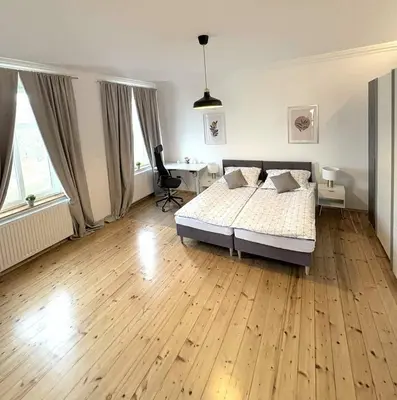 Łóżko lub łóżka w pokoju w obiekcie Parkview Premium Apartment