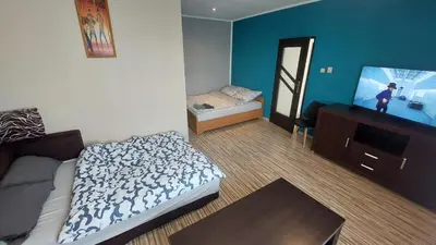 Łóżko lub łóżka w pokoju w obiekcie MagMar Studio rynek Kluczbork