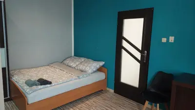 Łóżko lub łóżka w pokoju w obiekcie MagMar Studio rynek Kluczbork