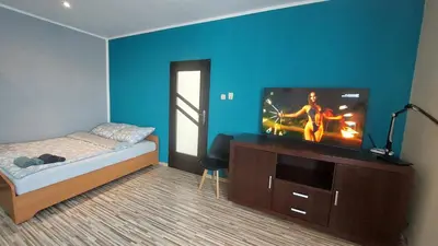 Łóżko lub łóżka w pokoju w obiekcie MagMar Studio rynek Kluczbork