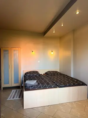 Łóżko lub łóżka w pokoju w obiekcie Apartamenty Gliwicka 12