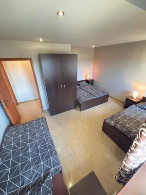 Łóżko lub łóżka w pokoju w obiekcie Apartamenty Gliwicka 12