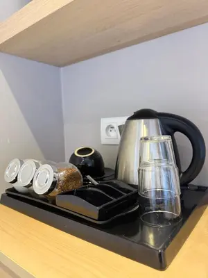Zestaw do parzenia kawy i herbaty w obiekcie Apartamenty Gliwicka 12