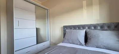 Łóżko lub łóżka w pokoju w obiekcie Apartament Srebrny Quick Park Oława