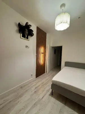 Łóżko lub łóżka w pokoju w obiekcie Elephant Studio