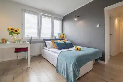 Łóżko lub łóżka w pokoju w obiekcie Legnicka Apartment Close to the City Center of Wroclaw by Rent like home Wroclaw