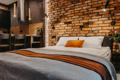 Łóżko lub łóżka w pokoju w obiekcie Walońska 19 - Luxury Loft Apartment - siłownia, sauna - Wrocław - Fair Rentals