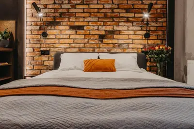 Łóżko lub łóżka w pokoju w obiekcie Walońska 19 - Luxury Loft Apartment - siłownia, sauna - Wrocław - Fair Rentals