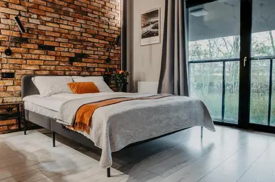 Łóżko lub łóżka w pokoju w obiekcie Walońska 19 - Luxury Loft Apartment - siłownia, sauna - Wrocław - Fair Rentals