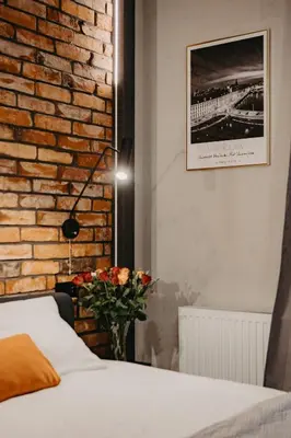 Łóżko lub łóżka w pokoju w obiekcie Walońska 19 - Luxury Loft Apartment - siłownia, sauna - Wrocław - Fair Rentals