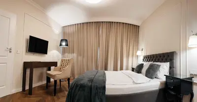 Łóżko lub łóżka w pokoju w obiekcie Lumina OVO