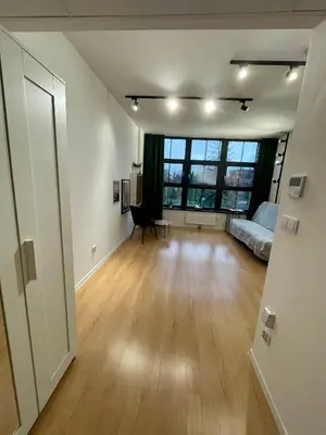 Łóżko lub łóżka w pokoju w obiekcie Apartamenty Bierutowska