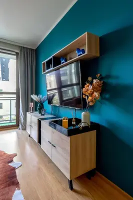 Telewizja i/lub zestaw kina domowego w obiekcie Odra Tower Apartment with Garage & Balcony - ProperUNIT