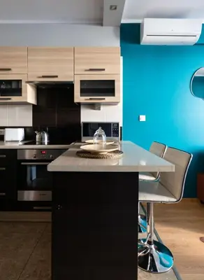 Kuchnia lub aneks kuchenny w obiekcie Odra Tower Apartment with Garage & Balcony - ProperUNIT