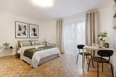 Łóżko lub łóżka w pokoju w obiekcie Old Town CityStay Rynek ul Więzienna 30 apartment 6