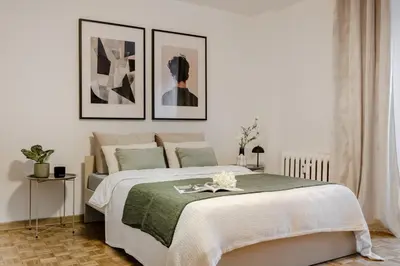 Łóżko lub łóżka w pokoju w obiekcie Old Town CityStay Rynek ul Więzienna 30 apartment 6
