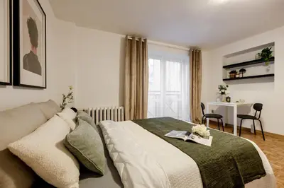Łóżko lub łóżka w pokoju w obiekcie Old Town CityStay Rynek ul Więzienna 30 apartment 6