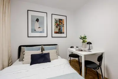 Łóżko lub łóżka w pokoju w obiekcie Old Town CityStay Rynek ul Więzienna 30 apartment 6