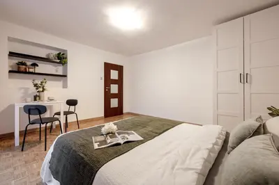 Łóżko lub łóżka w pokoju w obiekcie Old Town CityStay Rynek ul Więzienna 30 apartment 6