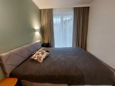 Łóżko lub łóżka w pokoju w obiekcie Apartamenty Czarna Góra 31