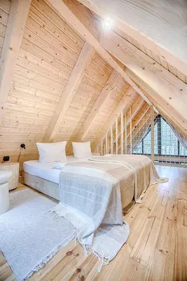 Łóżko lub łóżka w pokoju w obiekcie Leśny Chill House
