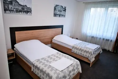 Łóżko lub łóżka w pokoju w obiekcie Restauracja Stylowa