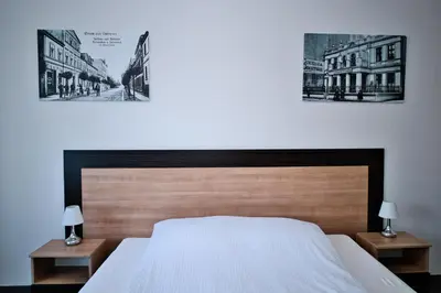 Łóżko lub łóżka w pokoju w obiekcie Restauracja Stylowa