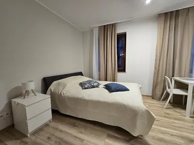 Łóżko lub łóżka w pokoju w obiekcie Happy Estate - ul Krawiecka 1 - BLISKO RYNEK