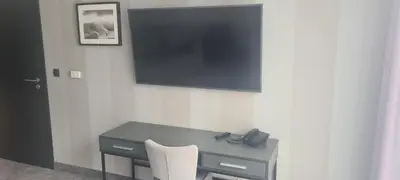 Telewizja i/lub zestaw kina domowego w obiekcie Czarna Perła Apartamenty Czarna Góra 404