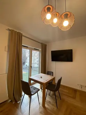 Telewizja i/lub zestaw kina domowego w obiekcie Montana Easy Stay Center