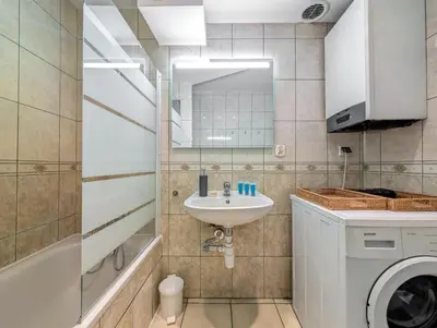 Łazienka w obiekcie Rynek Wrocław 3-Bedroom Apartment by BookingHost
