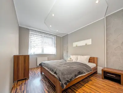 Łóżko lub łóżka w pokoju w obiekcie Krzywoustego City Comfort Apartment by BookingHost