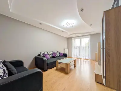 Część wypoczynkowa w obiekcie Krzywoustego City Comfort Apartment by BookingHost