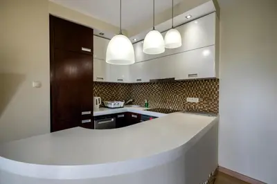 Kuchnia lub aneks kuchenny w obiekcie RentPlanet - Apartament Borowska