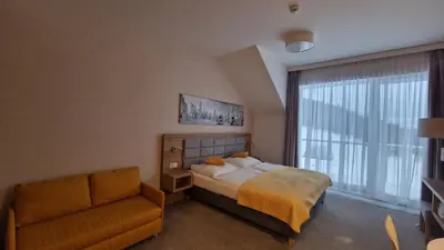 Łóżko lub łóżka w pokoju w obiekcie Czarna Góra Apartament 319