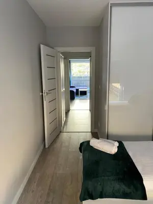 Łóżko lub łóżka w pokoju w obiekcie Apartament Da Vinci
